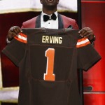 Florida State offensive lineman Cameron Erving poses for photos after being selected by the Cleveland Browns as the 19th pick in the first round of the 2015 NFL Draft, Thursday, April 30, 2015, in Chicago. (AP Photo/Charles Rex Arbogast)