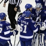 Tampa Bay Lightning players greet backup goalie Andrei Vasilevskiy after their win against the Chicago Blackhawks in Game 2 of the NHL hockey Stanley Cup Final on Saturday, June 6, 2015, in Tampa Fla. (AP Photo/John Raoux)