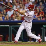 Philadelphia Phillies' Grady Sizemore singles to right field during the third inning of a baseball game, Saturday, May 16, 2015, in Philadelphia. Sizemore had four hits as the Phillies won 7-5. (AP Photo/Chris Szagola)