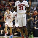 Arizona's Rondae Hollis-Jefferson celebrates a 3-point basket against Oregon during the first half of an NCAA college basketball game in the championship of the Pac-12 conference tournament Saturday, March 14, 2015, in Las Vegas. (AP Photo/John Locher)