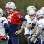 New England Patriots quarterback Tom Brady (12) warms up during practice Friday, Jan. 30, 2015, in Tempe, Ariz. The Patriots play the Seattle Seahawks in NFL football Super Bowl XLIX Sunday, Feb. 1. (AP Photo/Mark Humphrey)