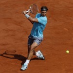 Spain's Rafael Nadal returns the ball during the final of the French Open tennis tournament against Serbia's Novak Djokovic at the Roland Garros stadium, in Paris, France, Sunday, June 8, 2014. (AP Photo/Michel Spingler)