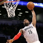United States Team's Shabazz Muhammad, of the Minnesota Timberwolves, dunks against the World Team during the first half of the Rising Stars NBA All-Star Challenge, Friday, Feb. 13, 2015, in New York. (AP Photo/Julio Cortez)