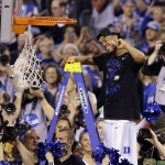 Duke's Quinn Cook cuts down the net after his team's 68-63 victory over Wisconsin in the NCAA Final Four college basketball tournament championship game Monday, April 6, 2015, in Indianapolis. (AP Photo/Darron Cummings)