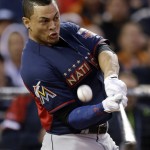  National League's Giancarlo Stanton, of the Miami Marlins, hits during the MLB All-Star baseball Home Run Derby, Monday, July 14, 2014, in Minneapolis. (AP Photo/Jeff Roberson)