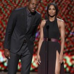 NBA player Andre Iguodala, of the Golden State Warriors, and Ciara present the award for best play at the ESPY Awards at the Microsoft Theater on Wednesday, July 15, 2015, in Los Angeles. (Photo by Chris Pizzello/Invision/AP)