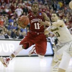 Indiana guard Yogi Ferrell (11) drives to the basket past Wichita State guard Fred VanVleet during the first half of an NCAA tournament college basketball game in the Round of 64, Friday, March 20, 2015, in Omaha, Neb. (AP Photo/Charlie Neibergall)