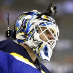 St. Louis Blues goalie Brian Elliot, a member of Team Foligno, wears a remote camera on his mask during warm ups before the NHL All-Star hockey skills competition in Columbus, Ohio, Saturday, Jan. 24, 2015. (AP Photo/Gene J. Puskar)