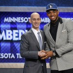 Karl-Anthony Towns, right, poses for a photo with NBA Commissioner Adam Silver after being announced as the top pick during the NBA basketball draft by the Minnesota Timberwolves, Thursday, June 25, 2015, in New York. (AP Photo/Kathy Willens)