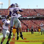 Kansas State fullback Glenn Gronkowski (48) and Charles Jones (24) celebrate a touchdown run by Jones during the first half of an NCAA college football game against Iowa State Saturday, Sept. 6, 2014, in Ames, Iowa. Kansas State won 32-28. (AP Photo/Justin Hayworth)
