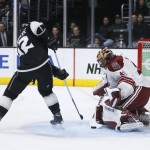 Arizona Coyotes goalie Mike Smith makes prevents Los Angeles Kings right wing Marian Gaborik, left, from scoring during a power play in the second period of an NHL hockey game, Monday, March 16, 2015, in Los Angeles. (AP Photo/Danny Moloshok)