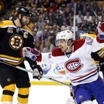  Montreal Canadiens center Daniel Briere (48) celebrates a goal by teammate P.K. Subban as Boston Bruins defenseman Zdeno Chara (33) is near during the first period in Game 1 of an NHL hockey second-round playoff series in Boston, Thursday, May 1, 2014. (AP Photo/Elise Amendola)