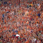 Dutch fans applaud their national team after their 2-0 victory over Chile in the group B World Cup soccer match between the Netherlands and Chile at the Itaquerao Stadium in Sao Paulo, Brazil, Monday, June 23, 2014. (AP Photo/Felipe Dana)