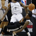 Phoenix Suns' Archie Goodwin fouls New Orleans Pelicans' Victor Rudd (2) during the first half of an NBA summer league basketball game Sunday, July 19, 2015, in Las Vegas. (AP Photo/John Locher)
