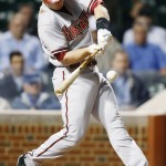  Arizona Diamondbacks' Paul Goldschmidt connects for a single against the Chicago Cubs during the first inning of a baseball game on Monday, April 21, 2014, in Chicago. (AP Photo/Andrew A. Nelles)