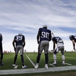 New England Patriots players practice at the Arizona Cardinals' facility Wednesday, Jan. 28, 2015, in Tempe, Ariz. From left are cornerback Kyle Arrington (25), cornerback Brandon Browner (39), defensive end Zach Moore (90), safety Patrick Chung (23), and practice squad defensive end Jake Bequette (92). The Patriots play the Seattle Seahawks in NFL football Super Bowl XLIX Sunday, Feb. 1, in Glendale, Ariz. (AP Photo/Mark Humphrey)
