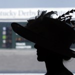 Amanda McMonigle looks over the paddock before the 141th running of the Kentucky Oaks horse race at Churchill Downs Friday, May 1, 2015, in Louisville, Ky. (AP Photo/Charlie Riedel)
