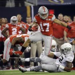 Ohio State's Jalin Marshall (17) returns a punt during the first half of the NCAA college football playoff championship game against Oregon Monday, Jan. 12, 2015, in Arlington, Texas. (AP Photo/David J. Phillip)
