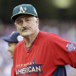 Former major league pitch pitcher Rollie Fingers looks on during the All-Star Legends & Celebrity Softball Game, Sunday, July 13, 2014, in Minneapolis. (AP Photo/Paul Sancya)