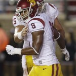 USC wide receiver George Farmer (8) is congratulated by offensive tackle Zach Banner (73) after Farmer caught a touchdown pass during the first quarter of their NCAA college football game against Boston College Saturday, Sept. 13, 2014 in Boston. (AP Photo/Stephan Savoia)