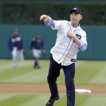 Actor J.K. Simmons throws out the ceremonial first pitch before an opening day baseball game between the Detroit Tigers and the Minnesota Twins in Detroit, Monday, April 6, 2015. (AP Photo/Carlos Osorio)
