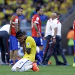 Brazil's Luiz Gustavo prays before a penalty shoot out at the end of the World Cup round of 16 soccer match between Brazil and Chile at the Mineirao Stadium in Belo Horizonte, Brazil, Saturday, June 28, 2014. Brazil won the match 3-2 on penalties after the match ended 1-1. (AP Photo/Andre Penner)
