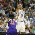 Minnesota Lynx forward Maya Moore (23) shoots the ball against Phoenix Mercury guard DeWanna Bonner (24) during the second half of Game 2 of the WNBA basketball Western Conference finals, Sunday, Aug. 31, 2014, in Minneapolis. The Lynx won 82-77 and Moore scored the most points with 32. (AP Photo/Stacy Bengs)