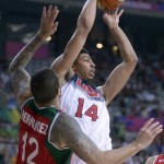 Anthony Davis of the U.S, right, shoots over Mexico's Hector Hernandez during Basketball World Cup Round of 16 match between United States and Mexico at the Palau Sant Jordi in Barcelona, Spain, Saturday, Sept. 6, 2014. The 2014 Basketball World Cup competition will take place in various cities in Spain from Aug. 30 through to Sept. 14. (AP Photo/Manu Fernandez) 