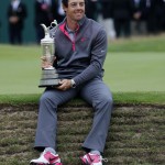 Rory McIlroy of Northern Ireland holds the Claret Jug trophy after winning the British Open Golf championship at the Royal Liverpool golf club, Hoylake, England, Sunday July 20, 2014. (AP Photo/Peter Morrison)