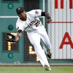 Pittsburgh Pirates right fielder Gregory Polanco (25) catches a fly ball by Arizona Diamondbacks' Ender Inciarte during the first inning of a baseball game in Pittsburgh Wednesday, July 2, 2014. (AP Photo/Gene J. Puskar)
