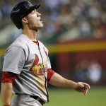 St. Louis Cardinals' Randal Grichuk walks off the field after being doubled up off first base by the Arizona Diamondbacks during the fifth inning of a baseball game Friday, Sept. 26, 2014, in Phoenix. (AP Photo/Ross D. Franklin)