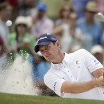  Justin Rose, of England, hits out of a bunker on the seventh hole during the fourth round of the Masters golf tournament Sunday, April 13, 2014, in Augusta, Ga. (AP Photo/Chris Carlson)