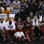  The Miami Heat bench watches action against the San Antonio Spurs during the second half in Game 5 of the NBA basketball finals on Sunday, June 15, 2014, in San Antonio. (AP Photo/Tony Gutierrez)