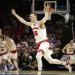 Wisconsin forward Sam Dekker (15) celebrates after Wisconsin beat Arizona 85-78 in a college basketball regional final in the NCAA Tournament, Saturday, March 28, 2015, in Los Angeles. Wisconsin advances to the Final Four in Indianapolis. (AP Photo/Jae C. Hong)