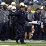 Notre Dame head coach Brian Kelly calls a play during the first half of an NCAA college football game against Stanford, Saturday, Oct. 4, 2014, in South Bend, Ind. (AP Photo/Darron Cummings)