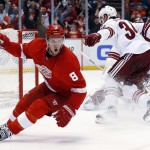 Detroit Red Wings left wing Justin Abdelkader (8) celebrates his goal against the against the Arizona Coyotes during the second period of an NHL hockey game in Detroit on Tuesday, March 24, 2015. (AP Photo/Paul Sancya)