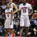 Arizona's Rondae Hollis-Jefferson (23) celebrates after a play against California in the first half of an NCAA college basketball game in in the quarterfinals of the Pac-12 conference tournament Thursday, March 12, 2015, in Las Vegas. Arizona's Parker Jackson-Cartwright (0) is on the left. (AP Photo/John Locher)