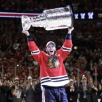 Chicago Blackhawks' Jonathan Toews hoists the Stanley Cup after defeating the Tampa Bay Lightning in Game 6 of the NHL hockey Stanley Cup Final series on Wednesday, June 10, 2015, in Chicago. The Blackhawks defeated the Lightning 2-0 to win the series 4-2. (AP Photo/Nam Y. Huh)
