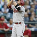 Arizona Diamondbacks' Welington Castillo points to the sky as he runs to home plate after hitting a solo home on a pitch from Seattle Mariners' Mike Montgomery during the second inning of a baseball game on Monday, July 27, 2015, in Seattle. (AP Photo/John Froschauer)