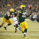 Green Bay Packers' Eddie Lacy celebrates his touchdown run during the first half of an NFL football game against the Atlanta Falcons Monday, Dec. 8, 2014, in Green Bay, Wis. (AP Photo/Tom Lynn)