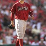 Arizona Diamondbacks relief pitcher Oliver Perez reacts after being hit on the leg by a line drive from St. Louis Cardinals' Matt Holliday during the seventh inning of a baseball game Monday, May 25, 2015, in St. Louis. (AP Photo/Jeff Roberson)