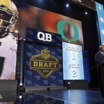 NFL commissioner Roger Goodell announces after the Tennessee Titans selected Oregon quarterback Marcus Mariota as the second pick in the first round of the 2015 NFL Draft, Thursday, April 30, 2015, in Chicago. (AP Photo/Charles Rex Arbogast)