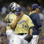 Milwaukee Brewers starting pitcher Kyle Lohse is pulled from a baseball game after giving up a three-run home run to Arizona Diamondbacks' Paul Goldschmidt during the fourth inning Saturday, May 30, 2015, in Milwaukee. (AP Photo/Jeffrey Phelps)