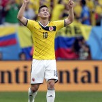 Colombia's James Rodriguez celebrates after scoring his side's opening goal during the group C World Cup soccer match between Colombia and Ivory Coast at the Estadio Nacional in Brasilia, Brazil, Thursday, June 19, 2014. (AP Photo/Marcio Jose Sanchez)