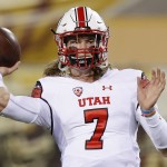 Utah's Travis Wilson throws a pass as he warms up prior to a NCAA college football game against the Arizona State on Saturday, Nov. 1, 2014, in Tempe, Ariz. (Photo/Ross D. Franklin)
