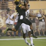 Arizona State wide receiver Cameron Smith (6) catches a touchdown pass next to UCLA defensive back Fabian Moreau (10) during the first half of an NCAA college football game, Thursday, Sept. 25, 2014, in Tempe, Ariz. (AP Photo/Matt York)