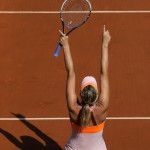 Russia's Maria Sharapova reacts as she defeats Romania's Simona Halep during their final match of the French Open tennis tournament at the Roland Garros stadium, in Paris, France, Saturday, June 7, 2014. Sharapova won 6-4, 6-7, 6-4. (AP Photo/Michel Spingler)