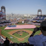 Fans view opening day baseball game ceremonies between the Philadelphia Phillies and the Boston Red Sox on Monday, April 6, 2015, in Philadelphia. (AP Photo/Matt Rourke)