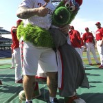 Actor Hafthor Julius Bjornsson, left, who plays Gregor Clegane also known as "The Mountain" on "Game of Thrones, clowns around with the Philadelphia Phillies Phanatic before a baseball game against the Arizona Diamondbacks, Friday, May 15, 2015, in Philadelphia. (AP Photo/Laurence Kesterson)
