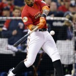  American League's Adam Jones, of the Baltimore Orioles, hits during the MLB All-Star baseball Home Run Derby, Monday, July 14, 2014, in Minneapolis. (AP Photo/Jeff Roberson)